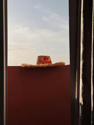 a hat sitting on top of a window at Gueliz Marrakech in Marrakech