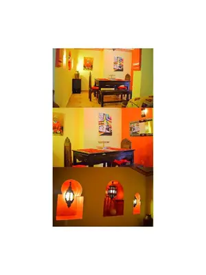 a collage of photos of a living room at Riad les ANGES DU DESERT in Marrakech
