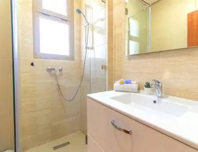 a bathroom with a sink and a shower at Appartement 3 in Marrakech