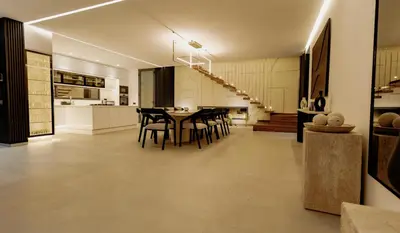 a kitchen and dining room with a table and chairs at Marrakech Oasis Retreat - 5-Bedroom Villa with Private Pool in El Makina