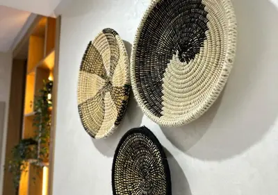 two plates hanging on a wall at Sérénité au coeur de Marrakech in Marrakech