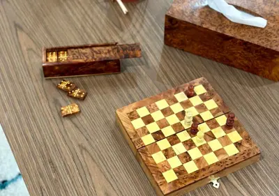 a chess board and chess pieces on the floor at Trésor andalous in Marrakech