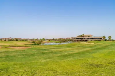 a view of the green at a golf course at Luxury Prestigia Paradise Garden-Pool in Marrakech
