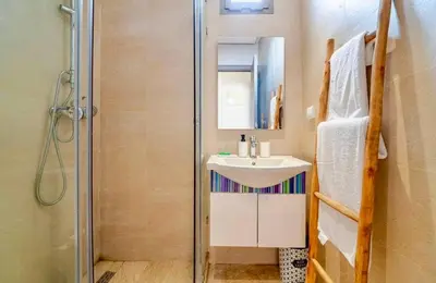 a bathroom with a sink and a shower at Appart Chambre et Salon Gueliz Marrakech Alia1 in Marrakech