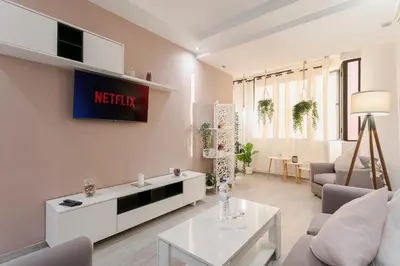 a living room with a couch and a table at Where Serenity Meets Style - Marrakech Downtown in Marrakech