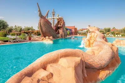 a large snake in a pool at a resort at Modern Oasis with Waterpark in Marrakech