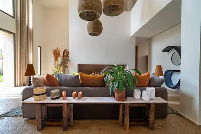 a living room with a couch and a table at Villa 61 in Marrakech