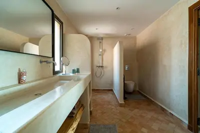 a bathroom with a sink and a toilet at Villa 61 in Marrakech