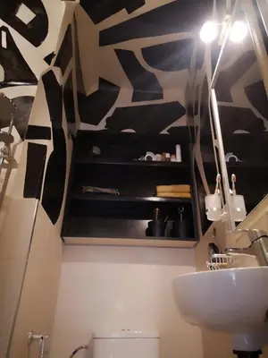 a bathroom with a sink and a white toilet at BAHIA BIKE APPART 1 - Terrasse in Marrakech