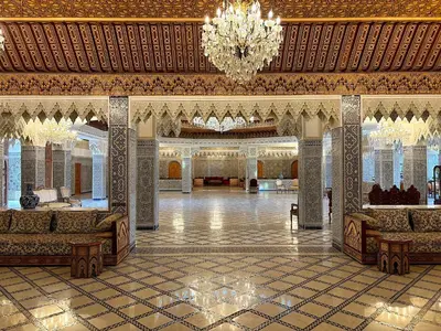 a large lobby with a chandelier in a building at Palais Bahida in Marrakech