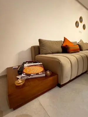 a living room with a couch and a coffee table at Comfy space in Marrakech