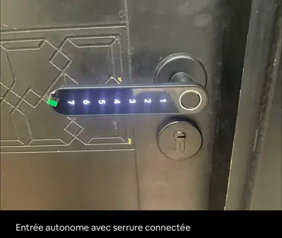 an emergency door handle on a metal door at Appartement 5 piscine sport in Marrakech