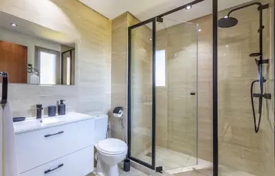 a bathroom with a shower and a toilet and a sink at Ali plaza marrakech in Marrakech