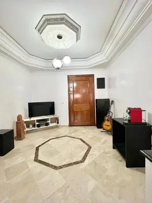 a living room with a large room with a ceiling at Marrastay in Marrakech