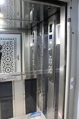 a microwave oven with glass doors in a kitchen at beautiful appartement near airport in Marrakech