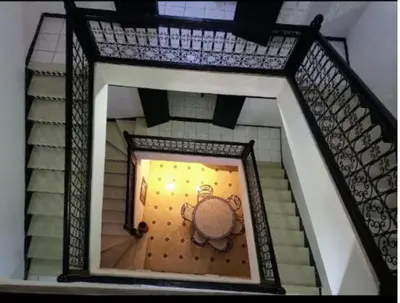 a model of a doll house with a table on the stairs at LOGEMENT ENTIER MARRAKECh G1 - N3 in Marrakech