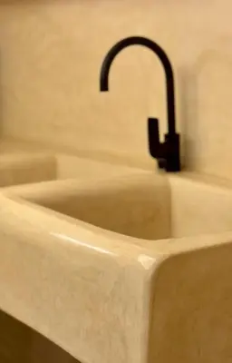 a sink with a faucet in a bathroom at Riad Le Jardin des Matières in Marrakech