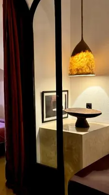 a table sitting on a table in a room at Riad Le Jardin des Matières in Marrakech