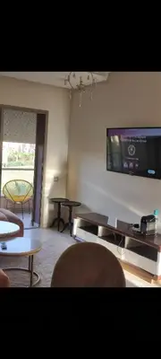 a living room with a flat screen tv on the wall at Prestigia réve in Marrakech
