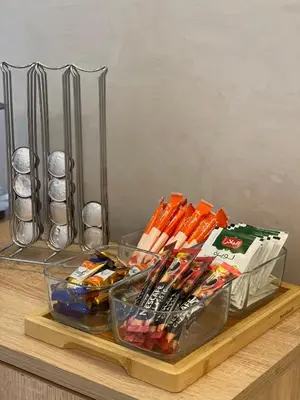 a counter with a tray of utensils on a table at Luxueux appartement a Marrakech in Marrakech