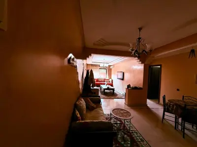 a living room with a couch and a table at Heart of Marrakech in Marrakech