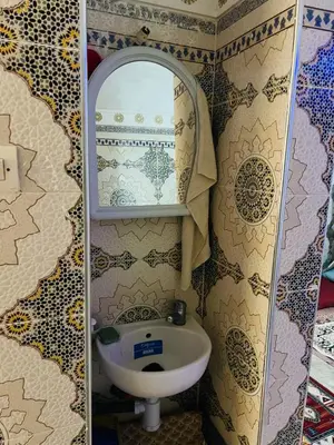 a bathroom with a sink and a mirror at Angel 12 minutes from Marrakech airport in Marrakech