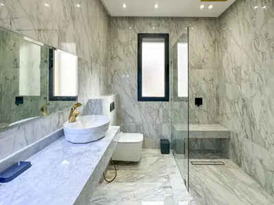 a bathroom with a sink and a toilet and a shower at Villa Stayvi 1 Heated Pool Bliss in Marrakech