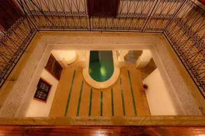 an overhead view of a staircase in a building at Riad Abrare in Marrakech