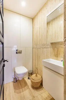 a bathroom with a toilet and a sink at New! Apt jacaranda, wifi and parking in Marrakech