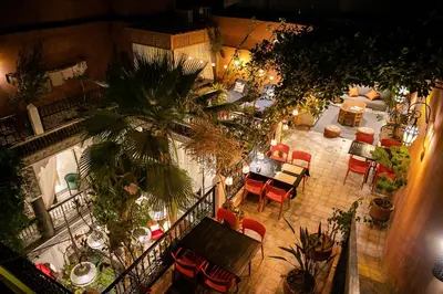 an overhead view of a restaurant with tables and chairs at Riad O'Zeen in Marrakech
