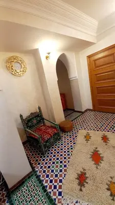 a room with a door and a rug on the floor at Charming Oasis in Marrakesh in Marrakech