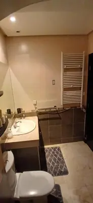 a bathroom with a toilet and a sink at Gueliz apartment 2 chambres Marrakech in Marrakech