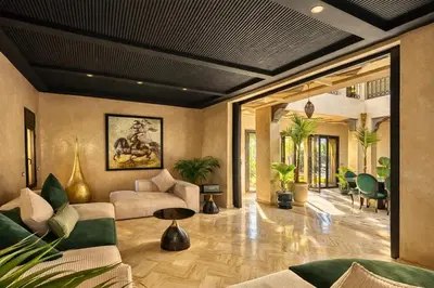 a living room with a couch and a table at Private Riad Alemania in Marrakesh - Pool - Rooftop in Marrakech