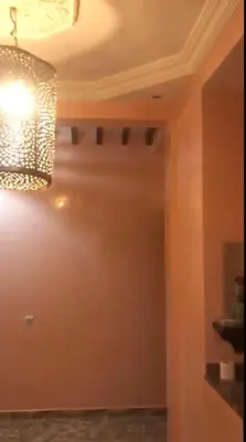 a chandelier hanging from a ceiling in a room at marrakech residential in Marrakech