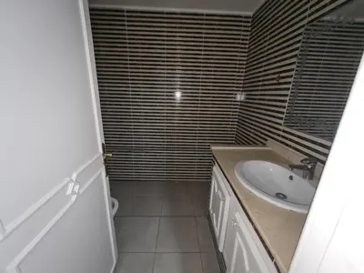 a bathroom with a sink and a toilet in it at résidence ATLASS in Marrakech