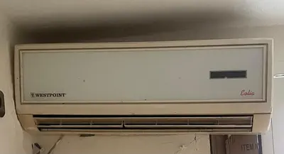 a television hanging from a ceiling in a room at Medina Marrakech Life in Marrakech