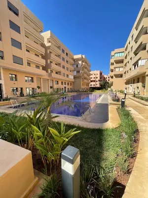 a swimming pool in the middle of a building at Luxury 2BR Pool Apartement Marrakech in Marrakech