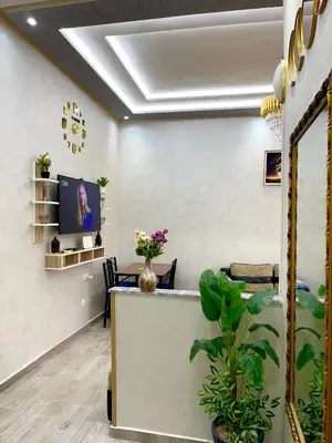 a room with a reception desk and a mirror at Mima in Marrakech