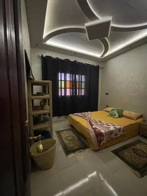 a bedroom with a bed in a room at Villa Marrakech in Marrakech