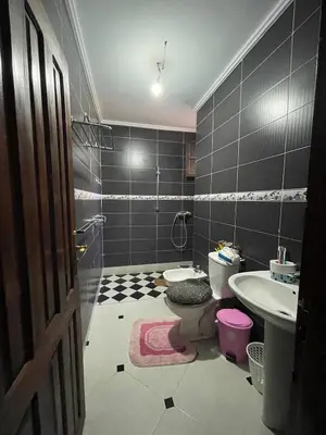 a bathroom with a toilet and a sink at Villa Marrakech in Marrakech