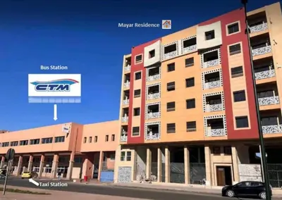 a rendering of an apartment building with a car parked in front at Cosy appartement au centre ville hivernage marrakech in Marrakech