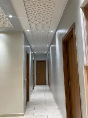 an empty hallway with a ceiling in a building at Appartement à louer Marrakech tous les services in Marrakech