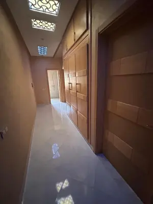 an empty hallway with a door and a skylight at villa Marrakesh in Marrakech