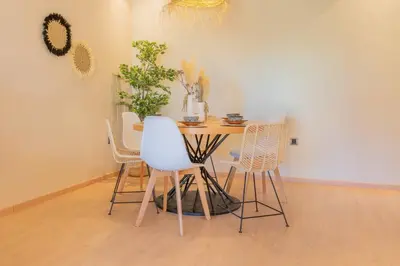 a dining room with a table and chairs at Wonderfull Place in Marrakech - Pool Wifi Terrace in Marrakech