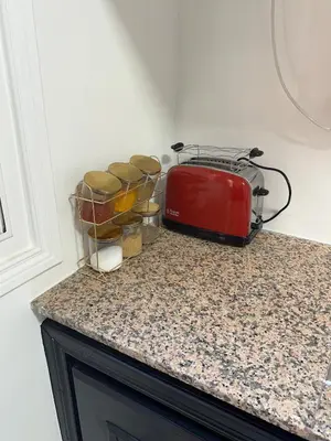 a toaster sitting on top of a kitchen counter at Calm Oasis with Private Terrace in Marrakech