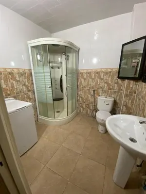 a bathroom with a shower and a toilet and a sink at Marrakech gliz in Marrakech