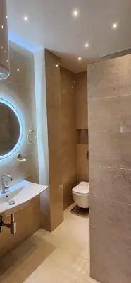 a bathroom with a sink and a toilet at الراحة والسلامة مراكش in El Gouassem