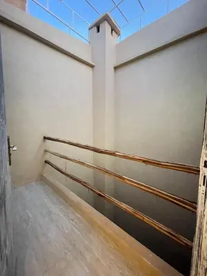 an empty room with a glass ceiling at Modern et calme a Marrakech in Marrakech