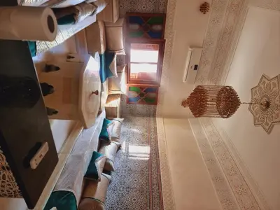 an overhead view of a hallway in a building with a door at amazing home and amazing rooftop in Marrakech