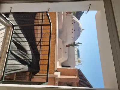 a view from a window of a stairway at amazing home and amazing rooftop in Marrakech